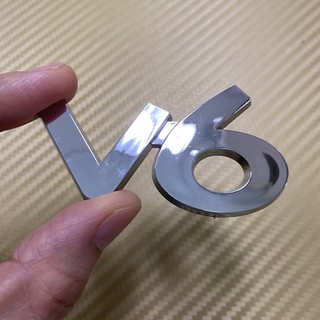 โลโก้* ตัวเลข  V6  สีชุบโครเมี่ยม ขนาด* 3.8 x 6.8 cm  ราคาต่อชิ้น