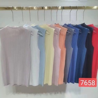 เสื้ออัดพลีทคอกลมเรียบร้อย 76580