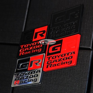 ป้ายโลโก้ โลหะ GR TOYOTA GAZOO Racing โตโยต้า กาซู ขนาด 4 x 6 cm. ติดท้ายรถ พร้อมกาวติดด้านหลัง