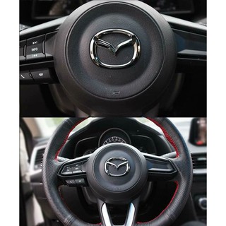 ครอบโลโก้พวงมาลัยสีดำ,แดง,ฟ้า,คาร์บอนเคฟงล่า  Mazda2,3 CX3 ,CX5,CX8 Skyactivทุกรุ่น