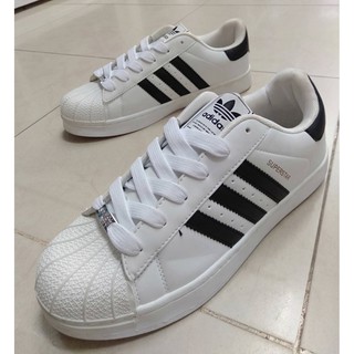 รองเท้าผ้าใบAdidas สีขาว / รองเท้าแฟชั่น ***ใส่ไม่ได้ เปลี่ยนได้ สบายใจค่ะ***