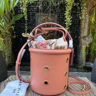 📌Drawstring Bucket Bag With Grommets Light Peach/Brass 69654 📌Size : 6 3/4" (L) x 7 1/2" (H) x 6 3/4" (W) 📌