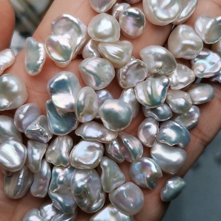 ไข่มุกแท้ เคชิ มุกkeshi สีและทรงเป็นธรรมชาติ สีขาว สีเงิน เงาสวย ขนาด10*12มิล ยังไม่เจาะรู สามารถทำจ