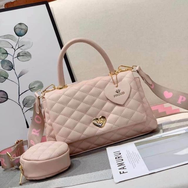 กระเป๋าแบรนด์แท้PROUDสวยหรูดูแพงขนาดฐานกว้าง10นิ้วสูง5นิ้วพัสดุหนัง  มาพร้อมกับสาย2เส้น สายหนัง ,สาย