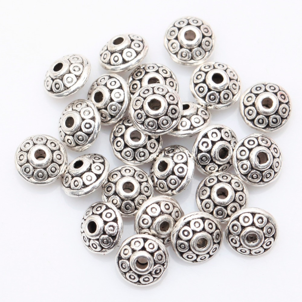 100 ชิ้นทิเบตเงินโลหะรูปไข่ UFO ลูกปัด Spacer ลูกปัดสําหรับเครื่องประดับทํา DIY Charm สร้อยข้อมือ 6.5 มม.x4 มม.