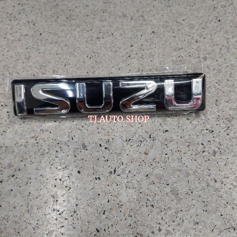 โลโก้ติดหน้ากระจัง ISUZU สีเงินพื้นดำ (ปี 2003-2011)