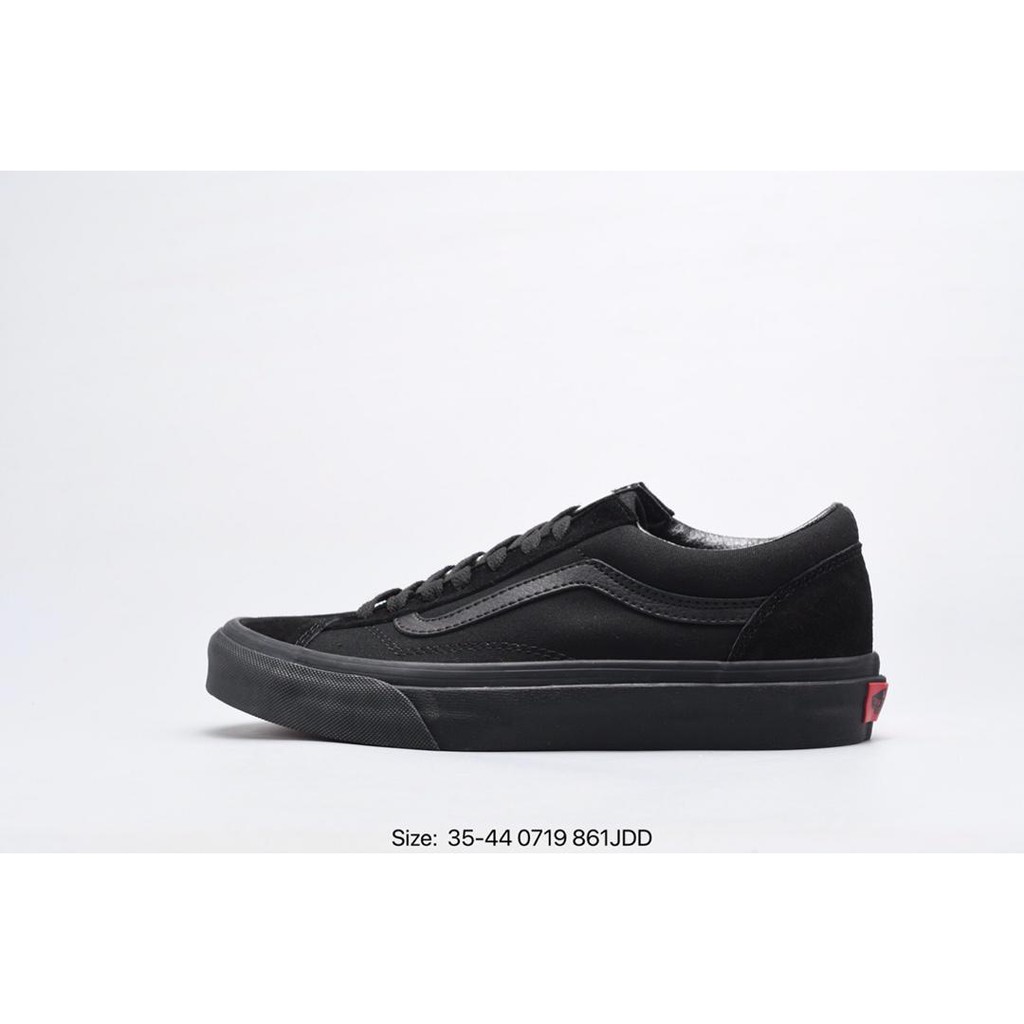 black low cut vans