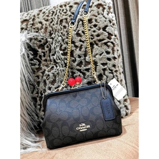 COACH FACTORY CLUTCH AND CROSSBODY