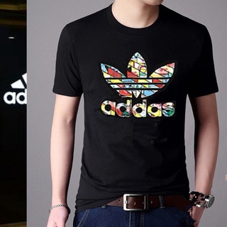 เสื้อยืดผ้าฝ้ายพิมพ์ลายขายดี สุดยอดไฟ Adidas Clover Clover จัดส่งเว็บไซต์อย่างเป็นทางการแขนสั้นเสื้อยืดผู้ชายชุดกีฬาข้าว