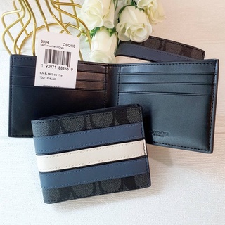 (ผ่อน0%) กระเป๋าสตางค์ชาย COACH SLIM BILLFOLD WALLET IN SIGNATURE CANVAS WITH VARSITY STRIPE 3004 ลายทางสีขาวน้ำเงิน