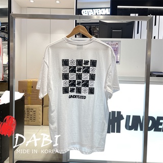 Undefeated เสื้อยืดแขนสั้น พิมพ์ลายดอกไม้ สไตล์เกาหลี สําหรับผู้ชาย และผู้หญิง