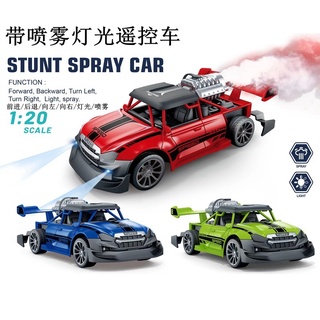 ProudNada Toys ของเล่นเด็ก รถแข่ง รถบังคับวิทยุ (มีควัน มีไฟ) 1:20(มี 3 สี ให้เลือก) KMRC STUNT SPRAY CAR NO.930-3