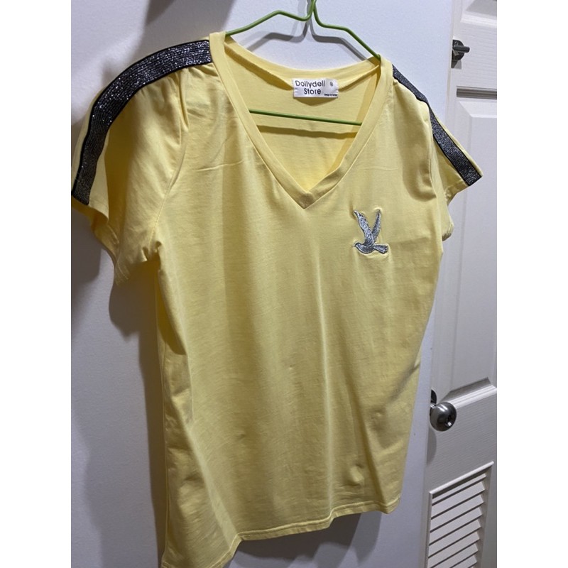 เสื้อยืด dollydell store