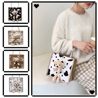 กระเป๋าถือ ลายการ์ตูน น้องหมี มาใหม่ สุดฮิตCartoon pattern handbag. Little bear. New arrival. Very popular.