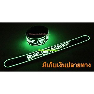 RISE AGAINST  Wristband ริสแบนด์ เรืองแสง กำไลยาง ปั๊มนูน วงร็อค pg129 ส่งไว