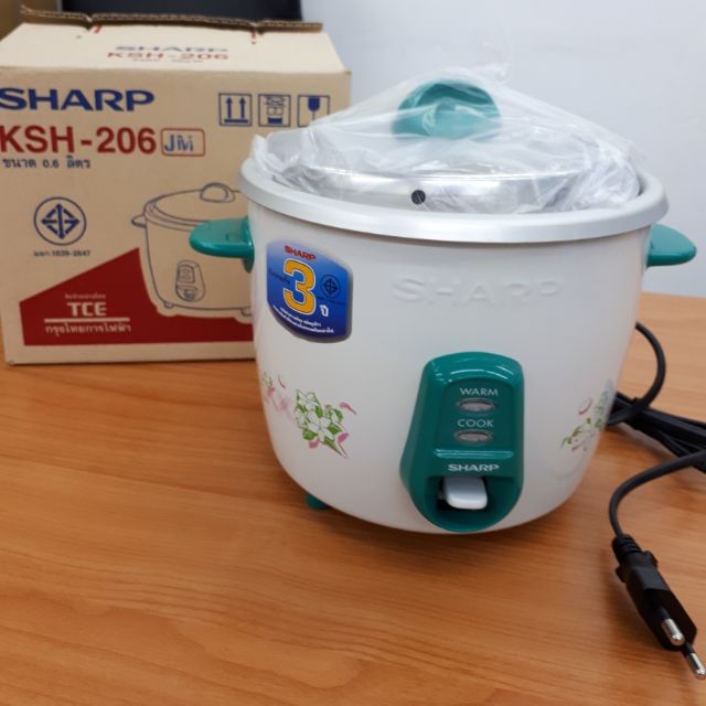 Sharp หม้อหุงข้าว ชาร์ป 0.6 ลิตร รุ่น KSH-D06 คละสี (ลด 80 บาท เพียงใช้โค้ด NEWNUA9 สำหรับลูกค้าใหม่