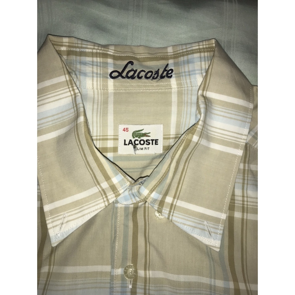เสื้อเชิ๊ต LACOSTE XL ลายสก็อตแขนยาวสีน้ำตาลอ่อน สินค้าแท้ 100% เอว 46นิ้ว แขนยาว 27นิ้วสภาพ 99%