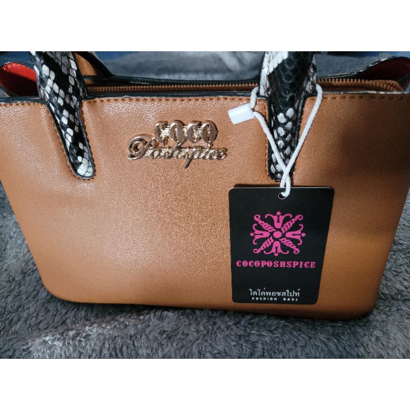 Sale กระเป๋า Cocoposhspice  มือ1.มีตำหนิตรงหูกระเป๋า