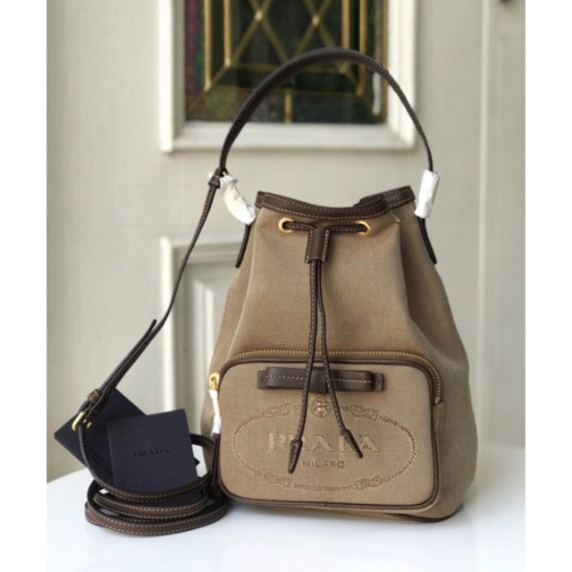 prada logo jacquard bucket bag