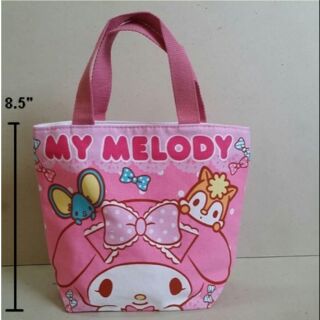 กระเป๋าถือ (ผ้า) ลาย มายเมโลดี้ (My melody) ขนาด 11x8.5 นิ้ว ปากกระเป๋ามีซิป ค่ะ