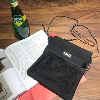 สินค้าพร้อมส่ง #LMC สตรีทแฟชั่นแบรนด์เกาหลีกระเป๋าผ้าตาข่ายกระเป๋าสะพายกระเป๋าสะพายข้างกระเป๋าใส่มือถือแบบพกพา
