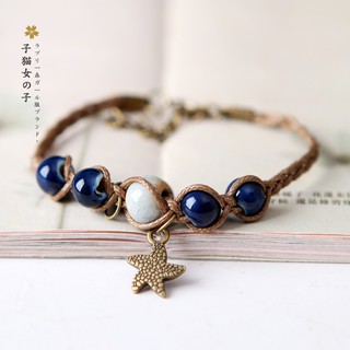 { พร้อมส่ง } สร้อยข้อมือลูกปัดเซรามิก แต่งจี้รูปดาว