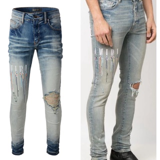 AMIRI light-colored logo hole stretch slim jeans