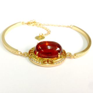 สร้อยข้อมือเพชรพญานาคสีแดง โลหะหุ้มทองเลเซอร์ 24 k.
