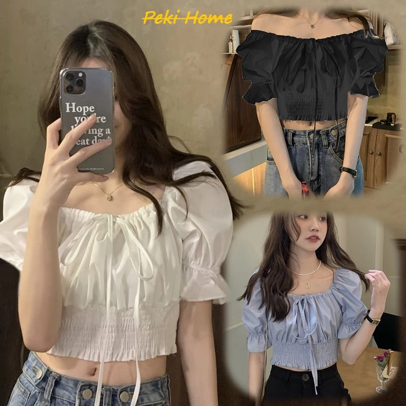 มาใหม่เสื้อครอปเอวลอยเเขนตุ๊กตาผูกโบว์ สีพื้นผ้าลื่น งานสม็อคเอว มี3สีไห้เลือก