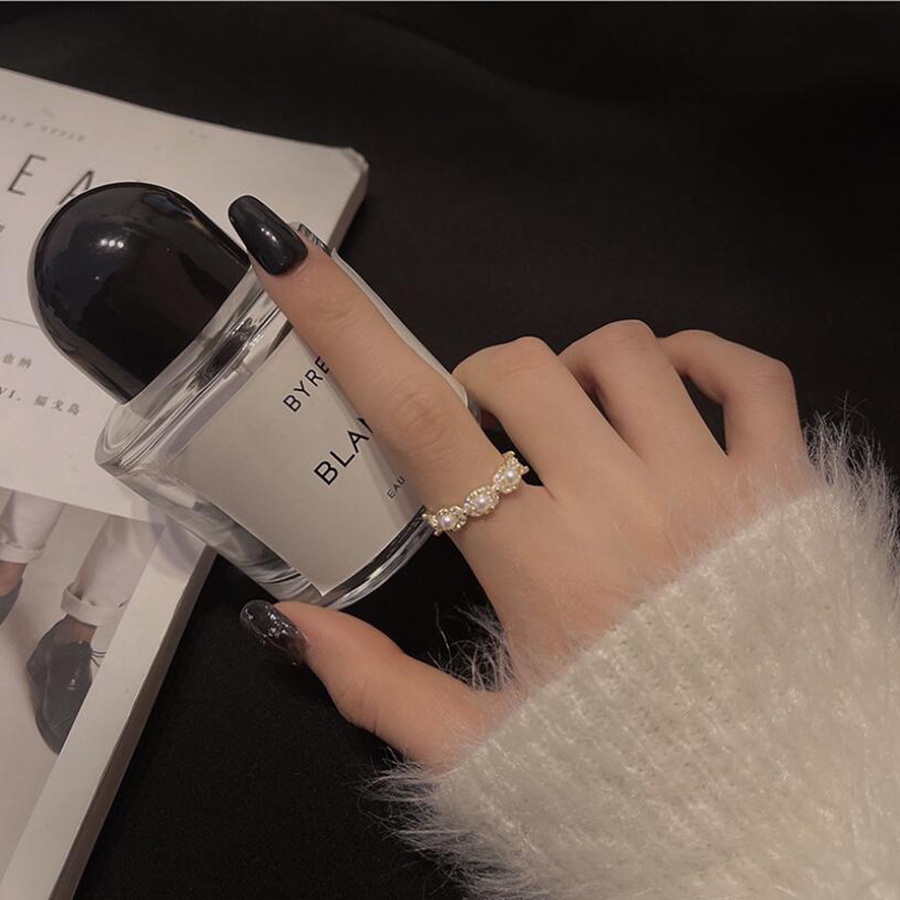 แหวนเหล็กไทเทเนียม ประดับมุก เพชร สีทอง หรูหรา ปรับขนาดได้ เครื่องประดับแฟชั่น สําหรับผู้หญิง - รูปที่ 2