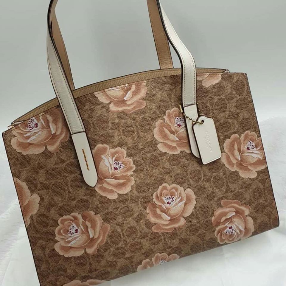 COACH Charlie Carryall In Signature Rose Print