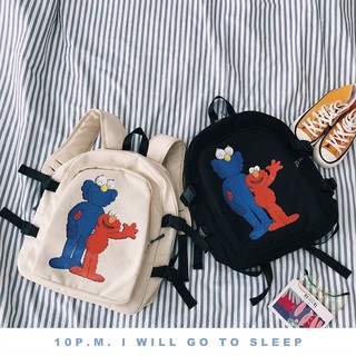 ทักแชทก่อนสั่ง 🕙 กระเป๋าเป้ลาย KAWS BFF สุดฮิต มี 2 สี เบจ ดำ (Dude backpack)