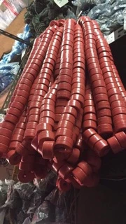 ทุ่นตลับ แบบกลม สีแดง (ขายเป็นพวง โดย 1 พวงมี 50 ชิ้น) ใช้สำหรับใส่อวน