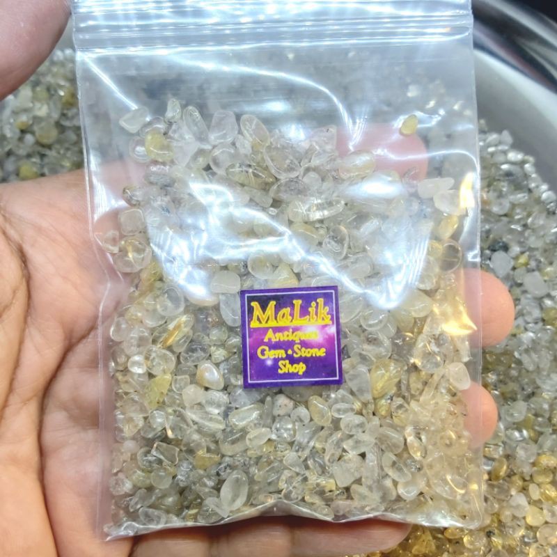 หิน ไหมทอง ( Golden Rutile Quartz ) เนื้อใส สวยมากๆ สินค้าเเนะนำของร้านเรา ถุงละ 100 กรัม ( g.)