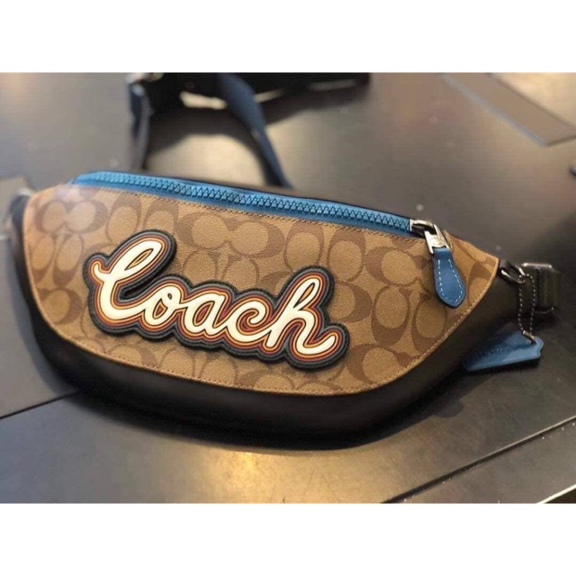 Coach Warren Belt Bag In Signature Canvas With Varsity Motif Khaki/Ama ...