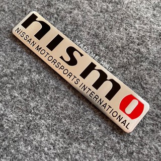 โลโก้ NISMO NISSAN MOTORSPORT INTERNATIONAL เพลทอลูมิเนียมบาง ขนาด 12x2.5cm