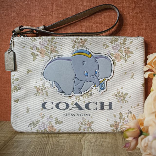 กระเป๋าคล้องมือCOACH Disney X Dumbo