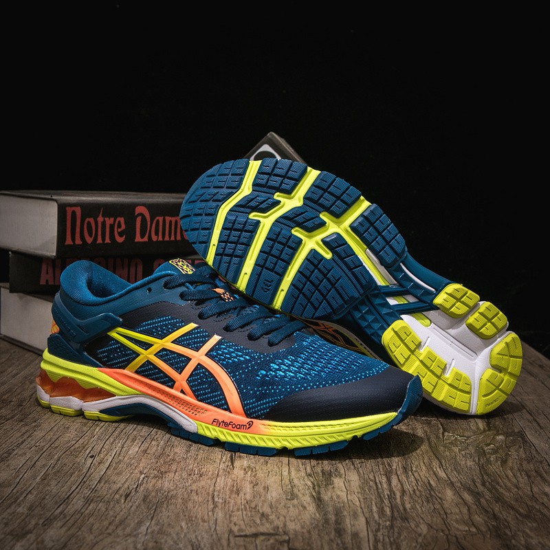 blue and yellow running shoes