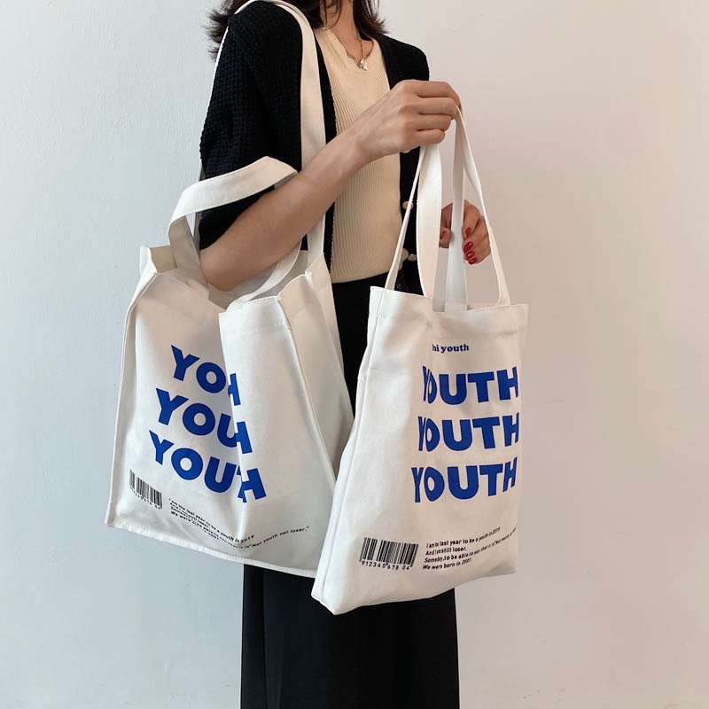 กระเป๋าผ้ามินิมอล Youth Youth Youth ผ้าหนา สีขาว กระเป๋าน้องอะตอม มี2ขนาด
