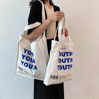 [ใช้โค้ด BH88BAGS ลดเพิ่ม] กระเป๋าผ้ามินิมอล Youth Youth Youth ผ้าหนา สีขาว มีสองขนาด