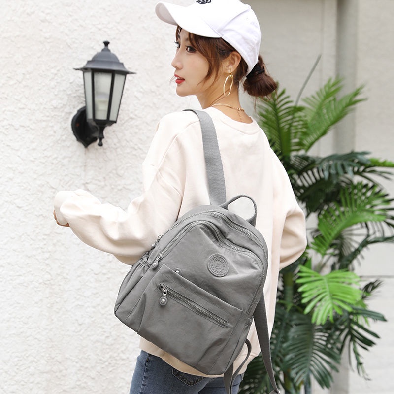 IELGY กระเป๋าเป้สะพายหลังผ้าไนลอนน้ําหนักเบาสําหรับเดินทางพร้อมฟังก์ชั่นความจุขนาดใหญ่และกันน้ํา - รูปที่ 4