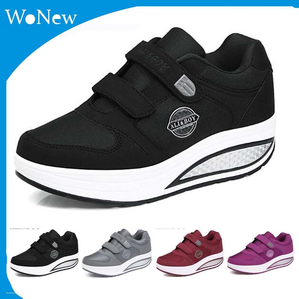 รองเท้าผ้าใบออกกําลังกายผู้หญิง Wedges Shake รองเท้าหนังกีฬารองเท้ากระชับสัดส่วนหนา