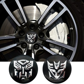 สติกเกอร์ Transformers Autobots Decepticons ขนาด 56 มม. สําหรับติดตกแต่งล้อรถยนต์ จํานวน 4 ชิ้น