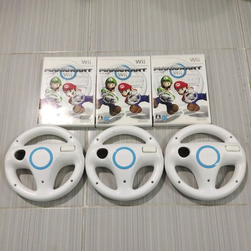 Nintendo Wii พวงมาลัยสำหรับเครื่องเล่นเกม Wii , แผ่นเกมส์
