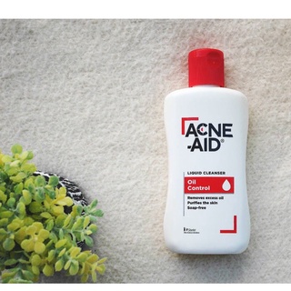 ACNE-AID LIQUID 100ML แดง ผลิตภัณฑ์ทำความสะอาดผิวหน้า สำหรับผิวมัน ผิวผสม และผิวที่มีแนวโน้ม เป็นสิวง่าย