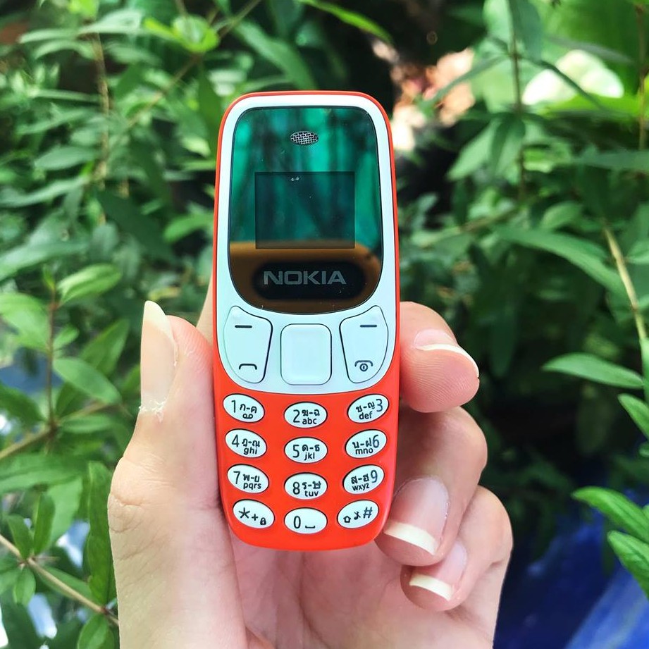 NOKIA  โทรศัพท์มือถือโนเกีย จิ๋ว (สีส้ม) ใช้งานได้  2 ซิม ปุ่มกด รุ่นใหม่ 2029
