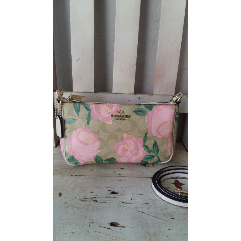 (ขายแล้ว).Coachทรงพอชลายกุหลาบ.(#ไม่แท้).มือสอง