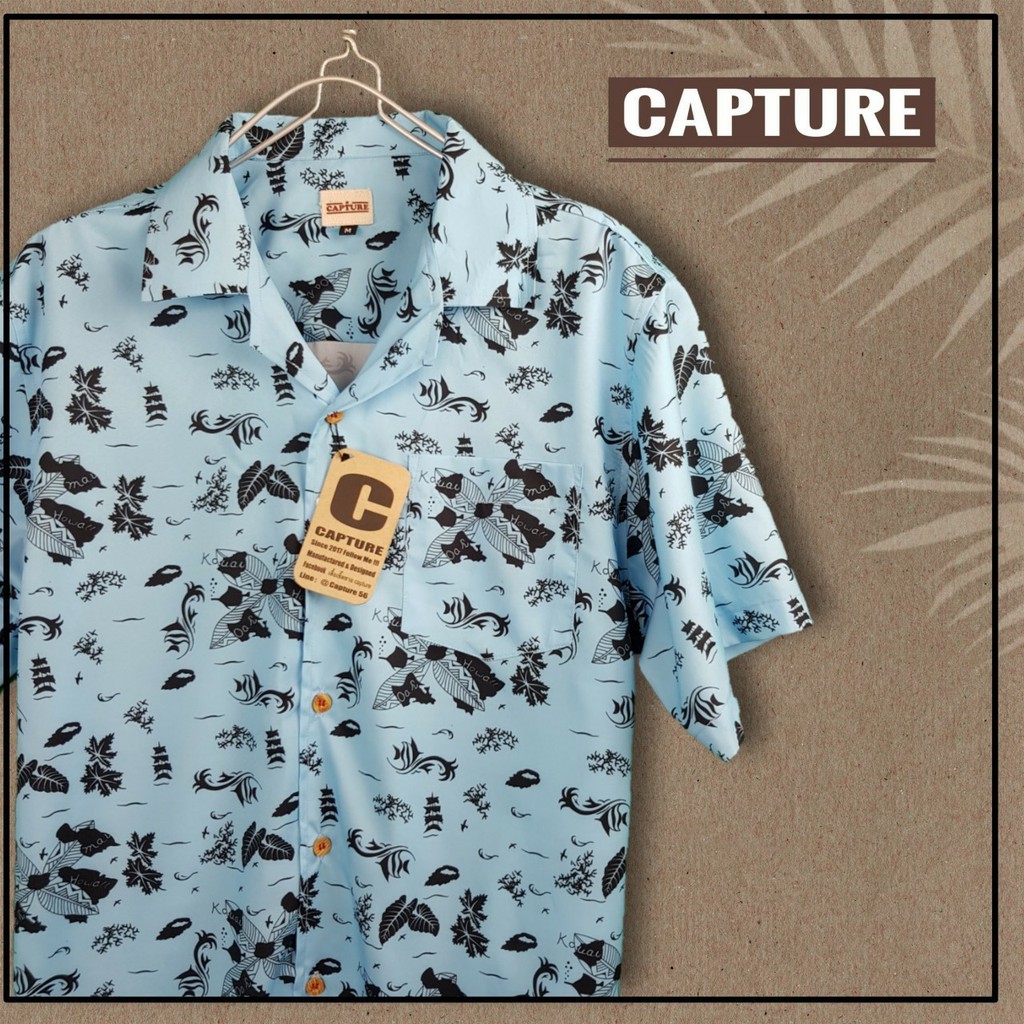 เสื้อเชิ้ตฮาวาย (Hawaii) แนวเดอะทอย ลายใบไม้ศิลป์ สีฟ้า มีไซส์ M-2XL ราคา ถูกที่สุด ดีลบีเคเค