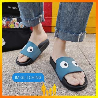 Slippers outdoor new big eyes personality couple trend non-slip soft bottom slippers รองเท้าแตะ