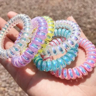 ยางรัดเกลียวสี Hologram สีสวยแวววาว เล่นแสง ยืดได้เยอะ ก่อนยืดขนาด 5.5cm. ยางรัดผม ยางมัดผม